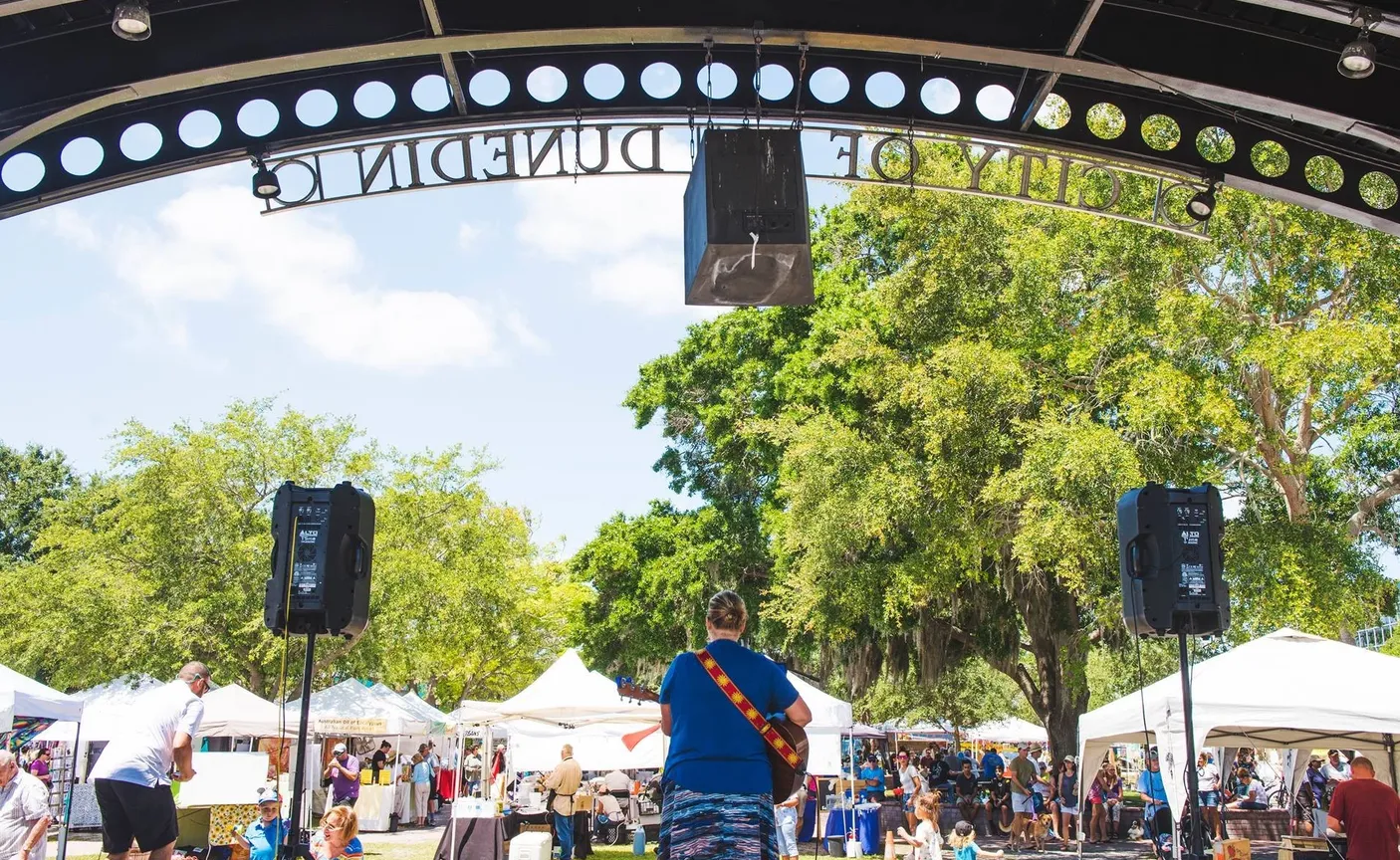Downtown market scene with a specialty food stall